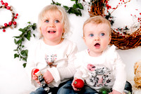Ivy aged three and Mable aged nine months enjoy their Christmas mini session at the Studio Upstairs, Ilminster.