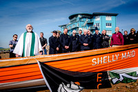 Exmouth Gig Club’s new boat, bought with donations from OneFamily Foundation Community Award, is blessed and sent on her maiden voyage.