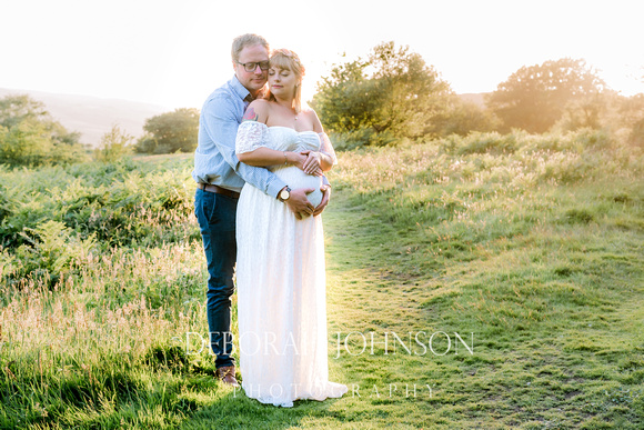 Gina and Luke look forrward to the birth of their son at a location shoot on te Quantock Hills.