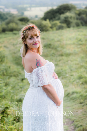 Gina and Luke look forrward to the birth of their son at a location shoot on te Quantock Hills.